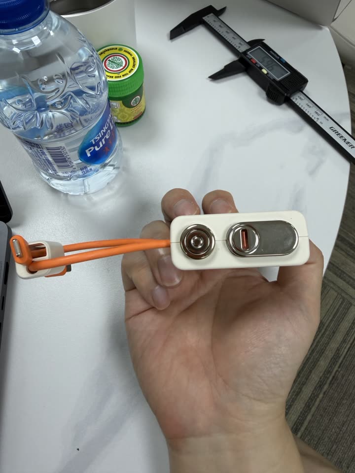 Original photo of the power bank top controls and ports